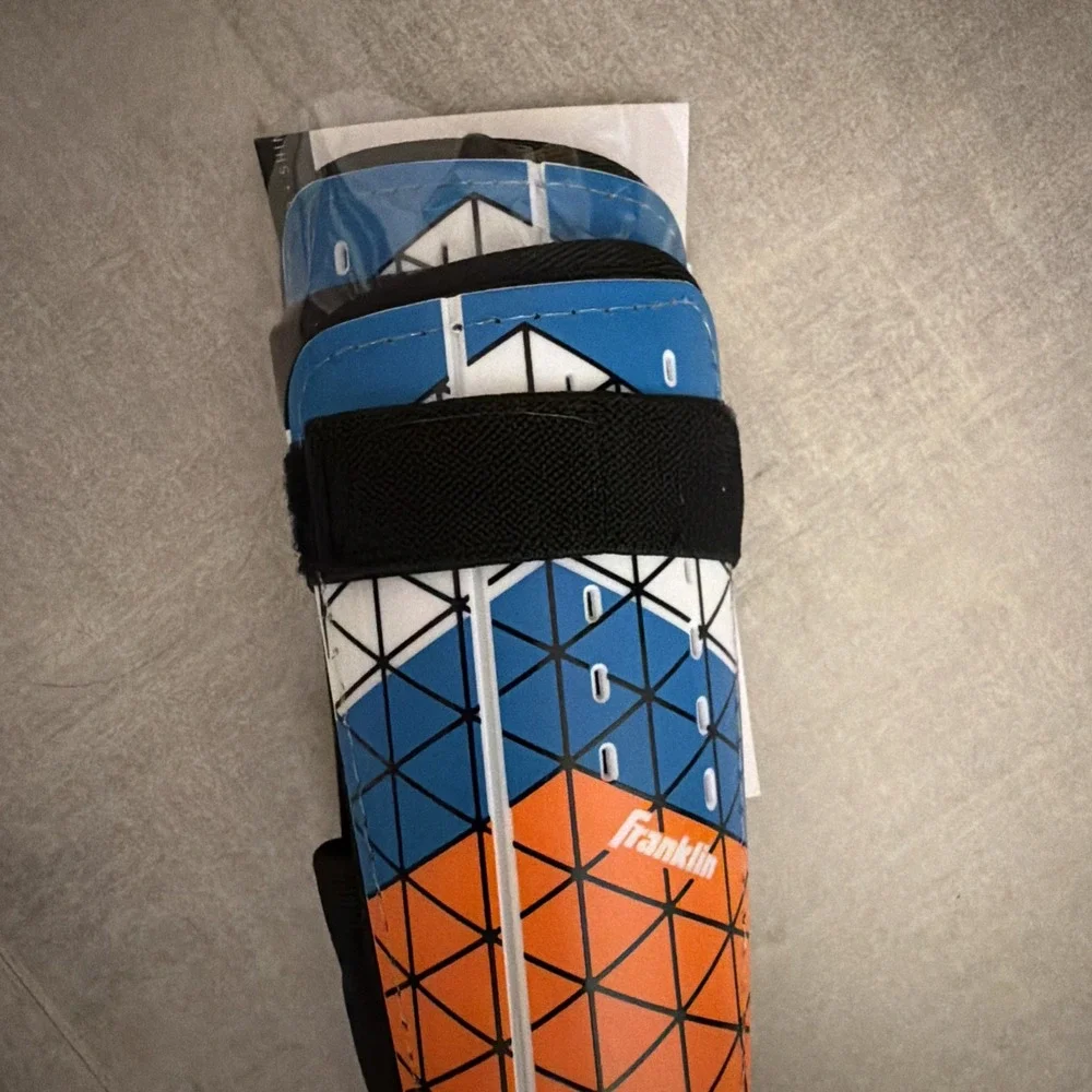 Franklin Sports Field Master Kids Small Shin Guards 2pk Blue/Orange.  4ft 7in